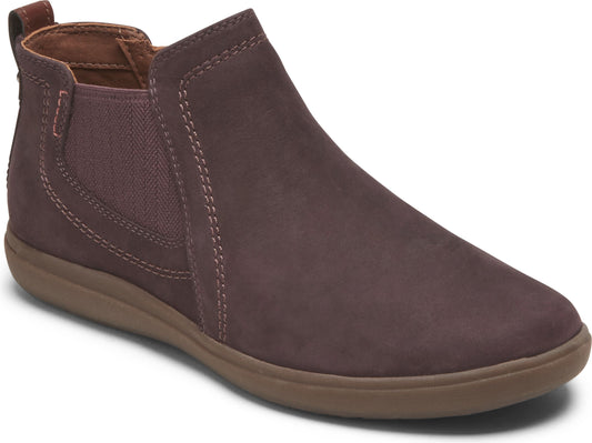 Dark brown nubuck ankle boot with elastic side panels and flat sole.