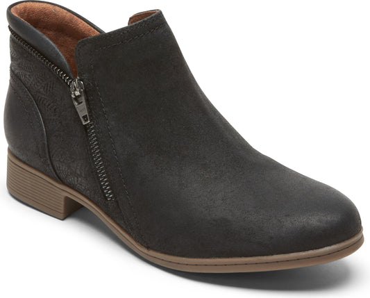 A dark brown ankle bootie with a side zipper and a low block heel.
