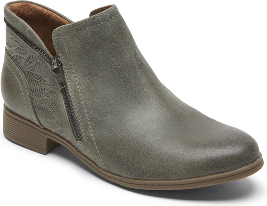 Gray ankle boot with side zipper and leaf pattern on the heel.