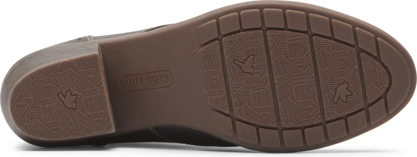 shoe sole with grooves and bird logo