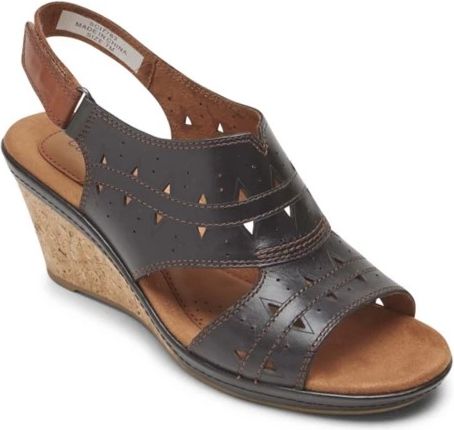 Wedge sandal with brown leather straps having triangle cutouts and cork sole.