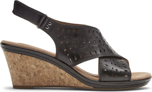 Dark leather wedge sandal with cut-out details and adjustable ankle strap.