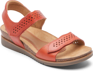 Burnt orange sandal with toe and ankle velcro straps featuring decorative perforations.