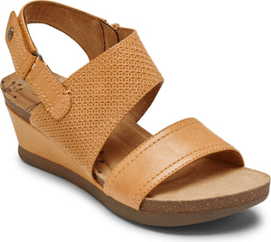 Tan women's sandal with two straps, the upper one is textured, wedge heel, and cork footbed.