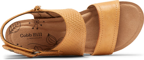 A tan-colored sandal with two straps and an open toe.