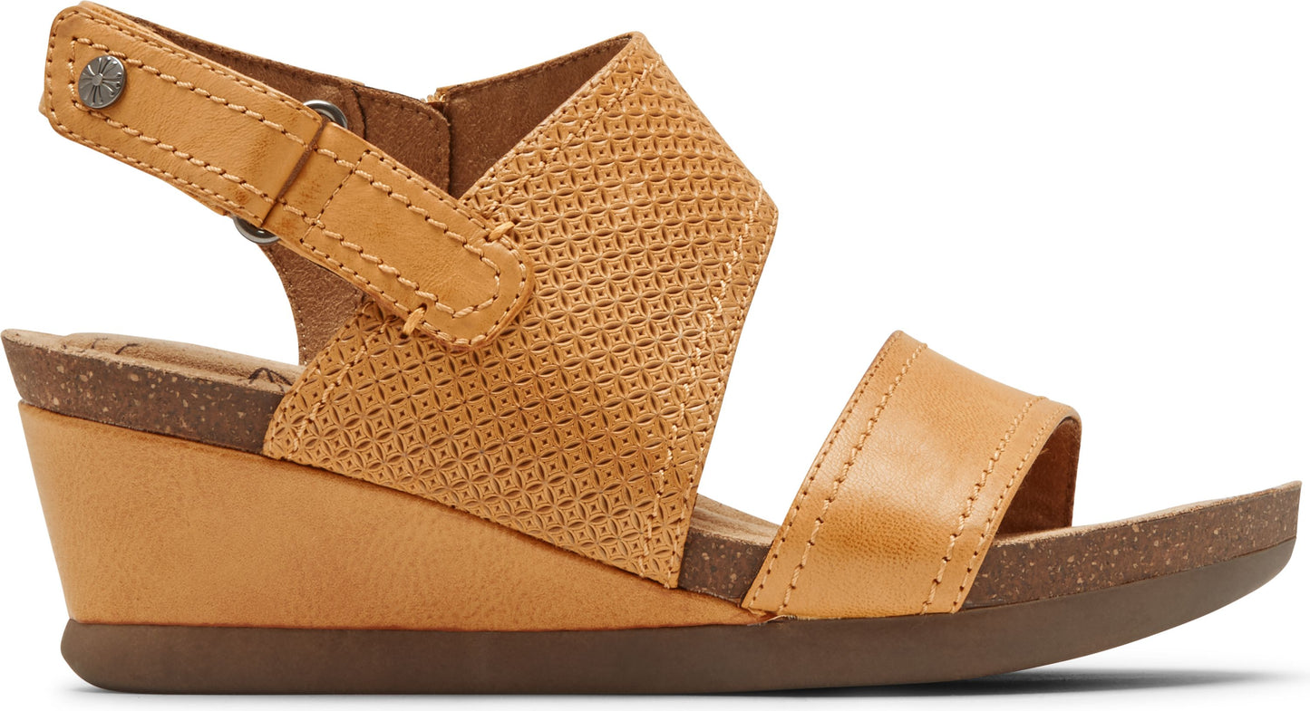 Tan wedge sandal with adjustable strap.