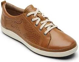 Tan leather sneaker with white laces and sole, featuring perforated detailing.