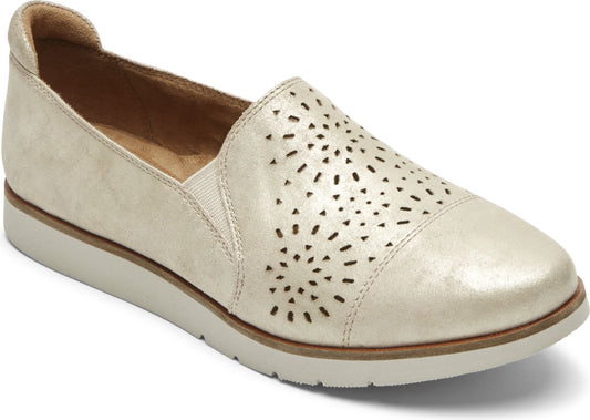 Gold-tone slip-on shoe with perforated design and a low, white sole.