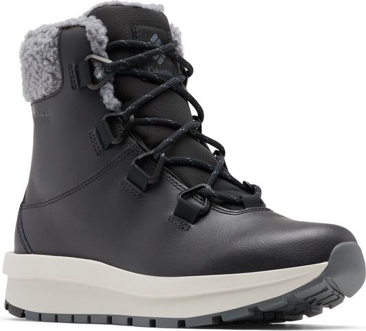 Black ankle boot with white sole and faux fur trim and black laces.