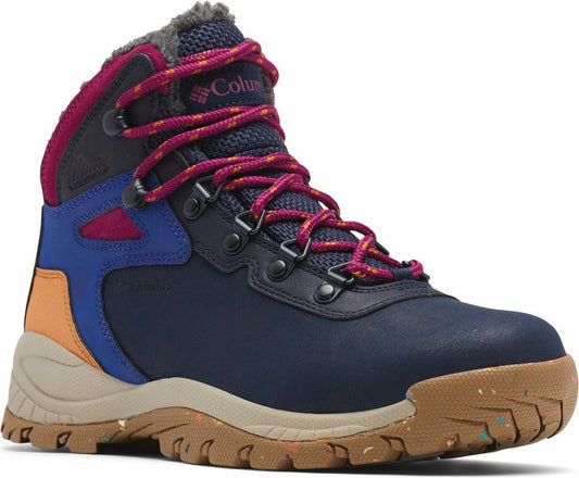Mid-rise hiking boot, navy with blue, orange, and magenta accents; pink and gold laces; lug sole.