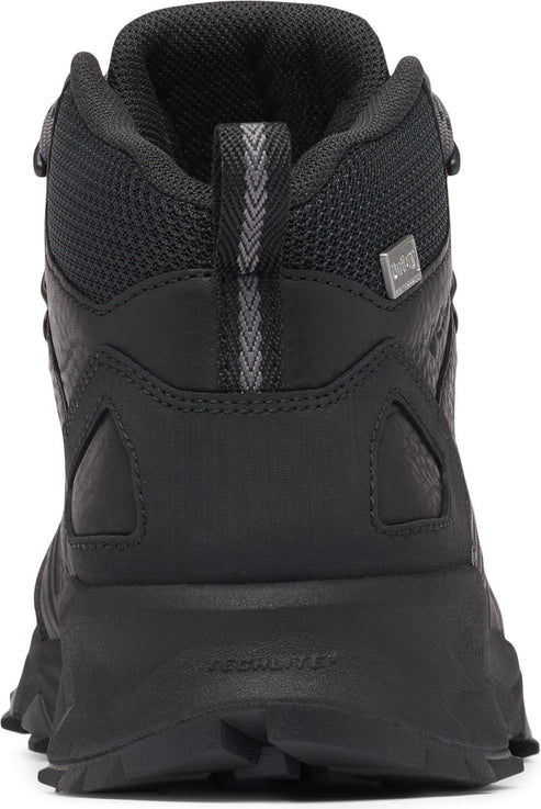 Back view of a black hiking boot with a mesh top and Goodyear rubber outsole.