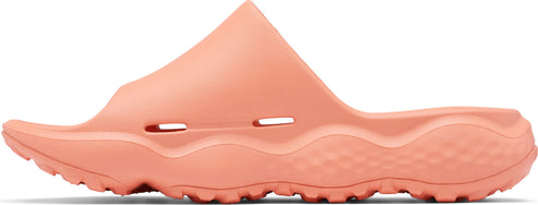 A salmon-colored slide sandal with a textured sole.