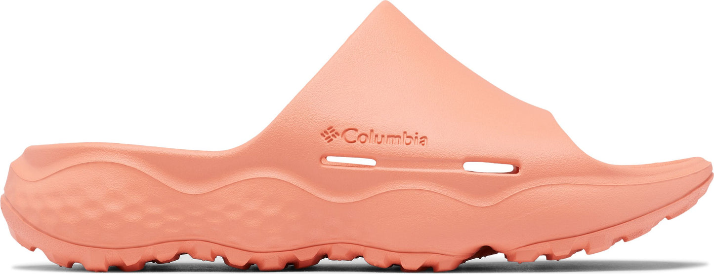 Peach colored slide sandal with thick sole and Columbia logo.