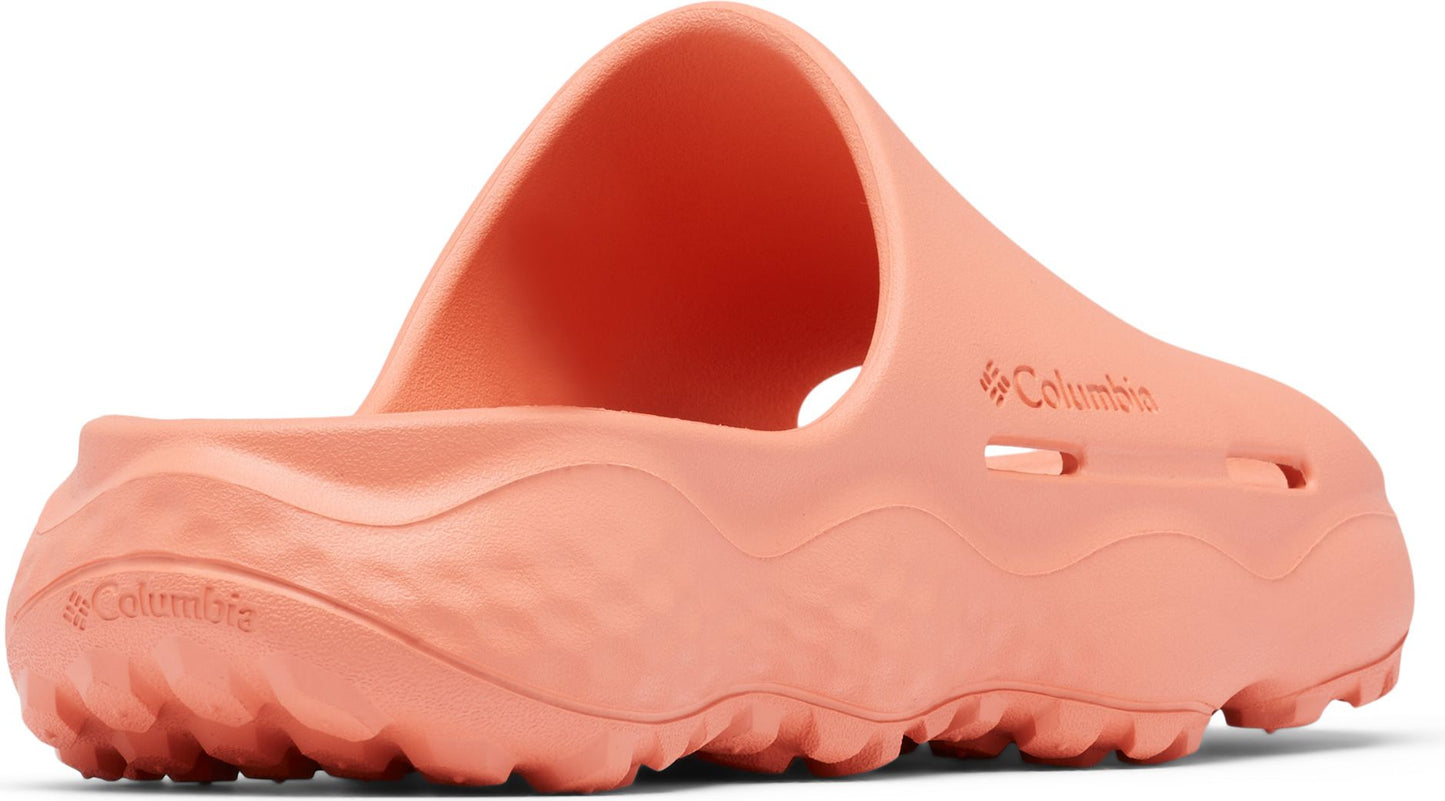 Coral-colored slip-on sandal with ridged sole and Columbia logo.