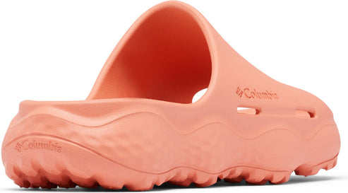 Coral-colored slip-on sandal with ridged sole and Columbia logo.