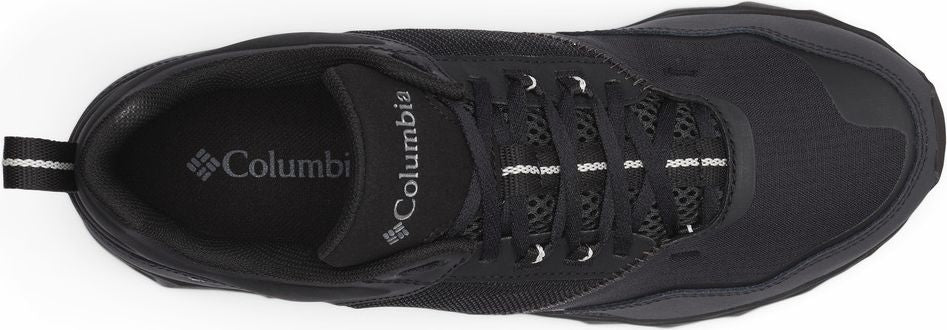 Black shoe with white laces and Columbia logo.