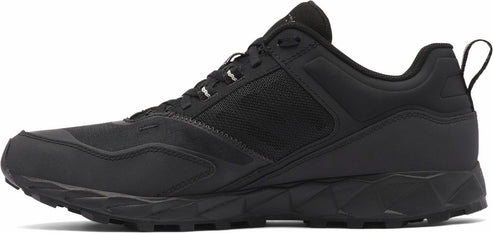 A black running shoe with a low profile, textured sole, and a fabric panel on the side.
