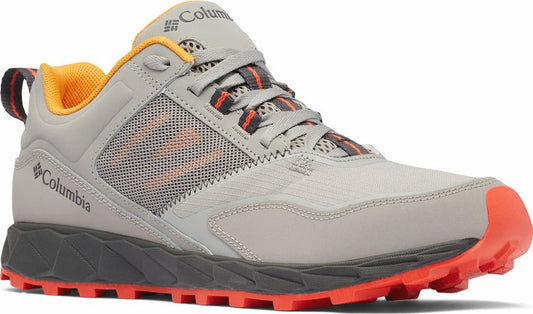 Gray low-cut shoe with orange accents and black lug sole.