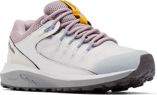 A white and grey running shoe with lavender details and grey sole.