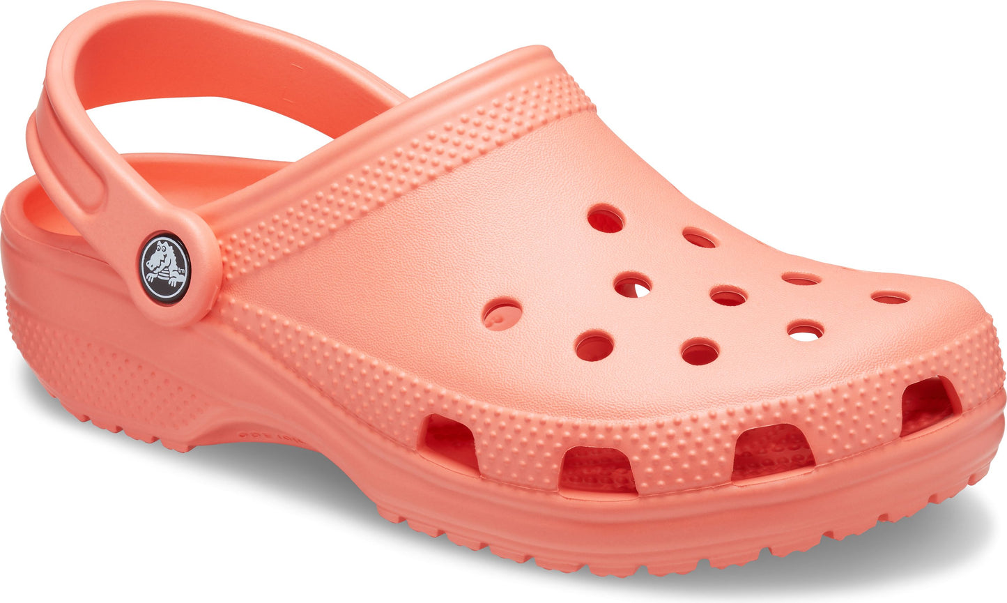 Coral clog with holes on the upper and heel strap.