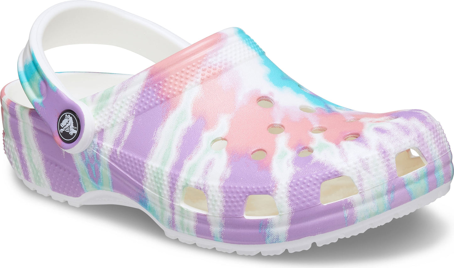 Tie-dye patterned clog with white heel strap and white sole.