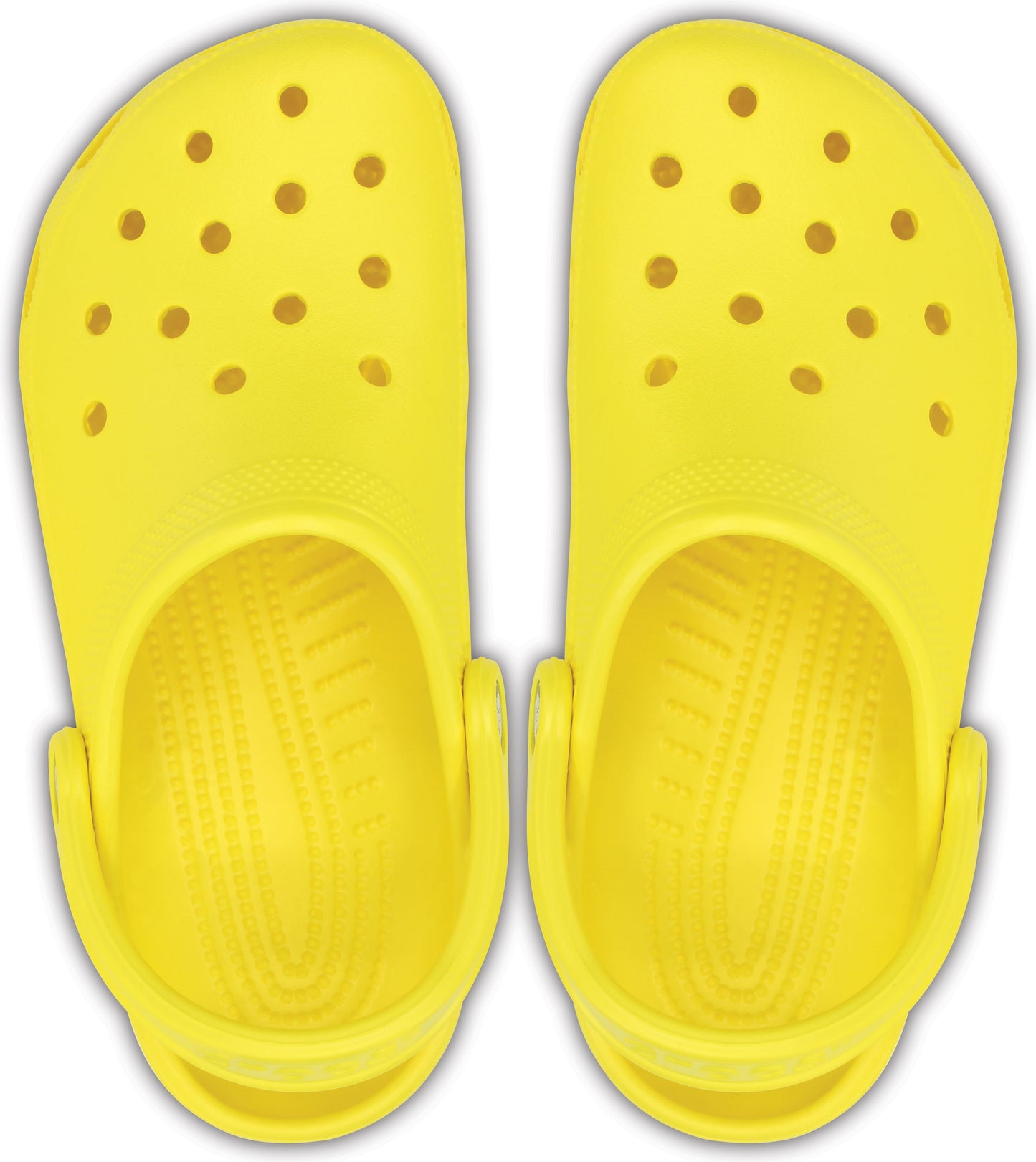 Two yellow clog shoes, top view, with multiple holes and heel straps.