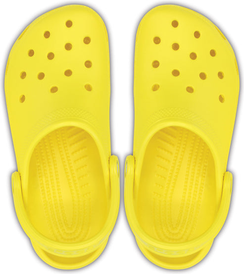 Two yellow clog shoes, top view, with multiple holes and heel straps.