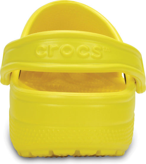 Back view of a bright yellow clog with a pivoting heel strap.
