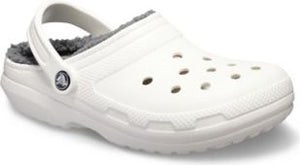 White clog shoe with gray fuzzy lining and heel strap.