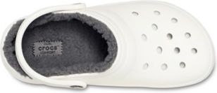 White clog-style shoe with faux fur lining.