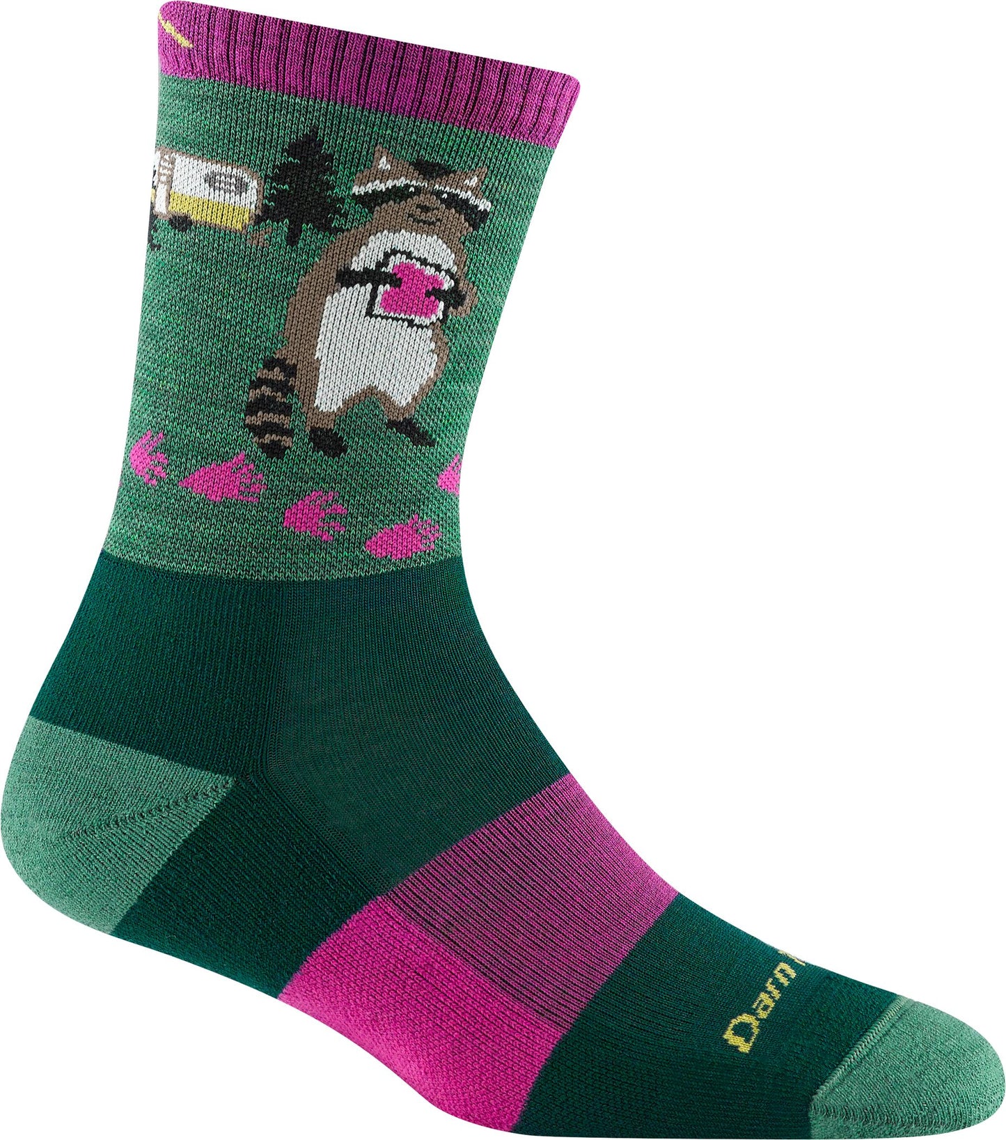 Crew sock with a camping raccoon reading a book near a tree and an RV, dark green leg with green heel and toe, and pink and green stripes at the foot's arch.