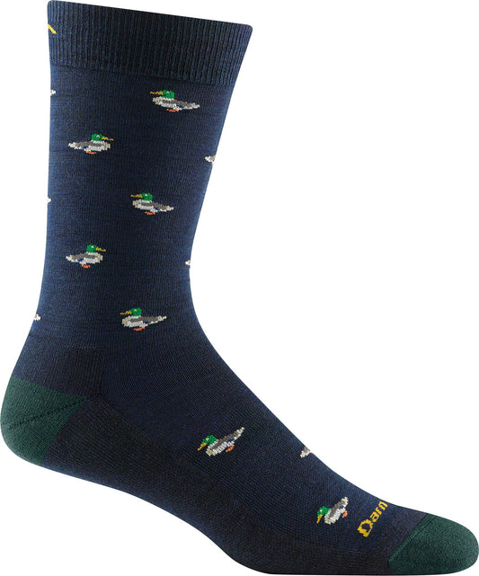 Navy blue sock with duck pattern and green heel and toe.