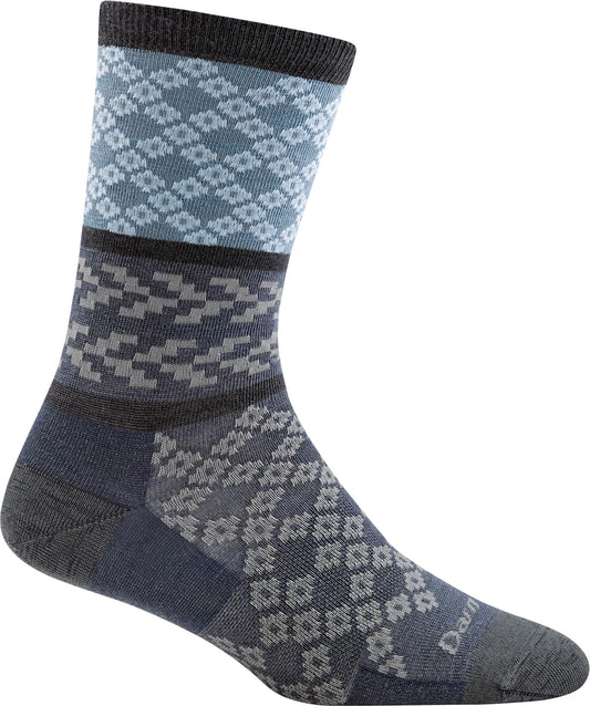 Wool sock in blue and gray with geometric patterns and darker cuff.