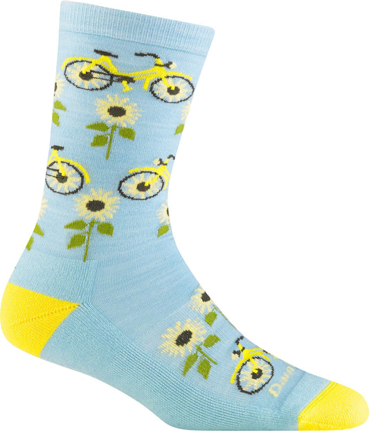 A light blue sock with yellow bicycles and sunflowers, yellow reinforced heel and toe.