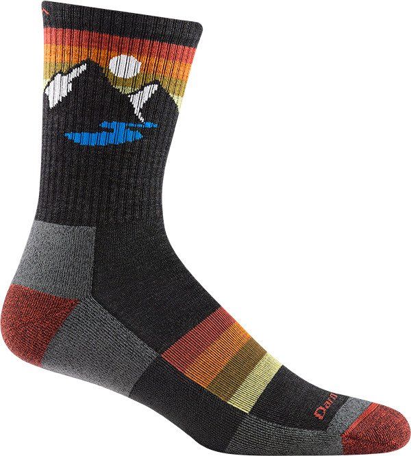 One crew sock with a mountain scene and colorful stripes.