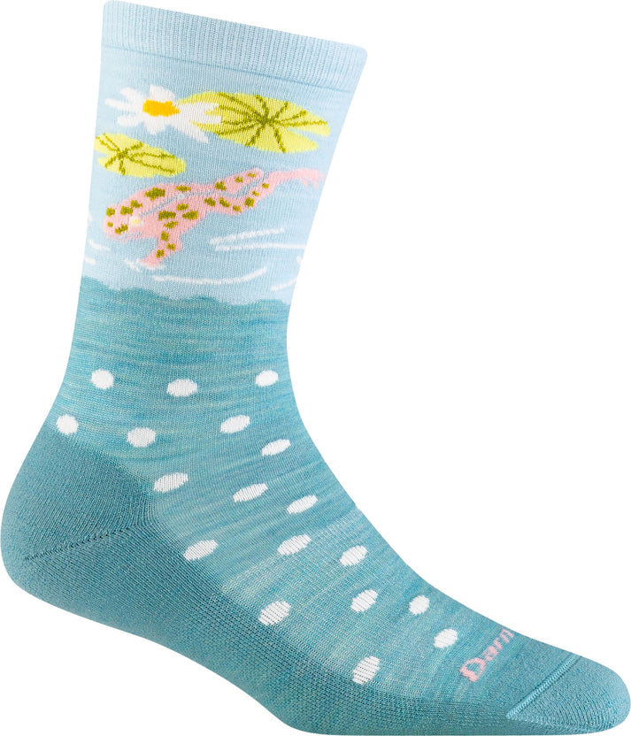 Teal sock with a narwhal and water lily design and white dots at the bottom.