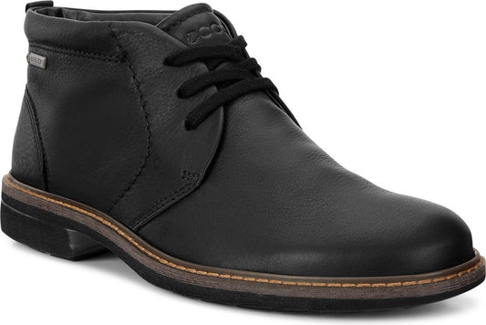 Black leather chukka boot with dark laces and a thin brown and black sole.