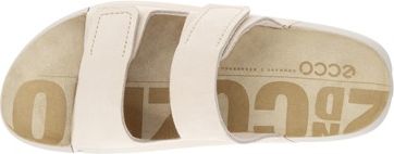 Off-white sandal with three adjustable straps.