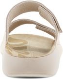 Rear view of a beige sandal with two adjustable velcro straps.