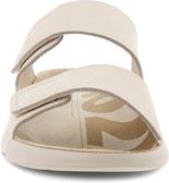 Beige sandal with two straps and velcro closures.