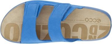 A sandal with three blue velcro straps.