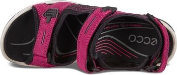 Pink sandals with velcro straps.