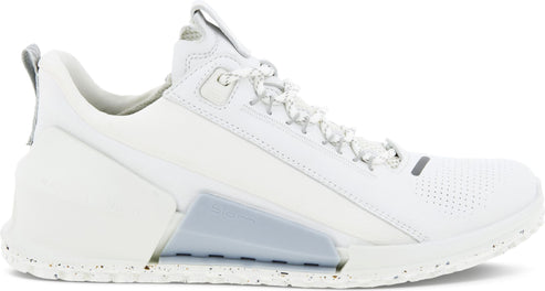 A white athletic shoe with speckled sole, white laces, and a translucent section on the side.