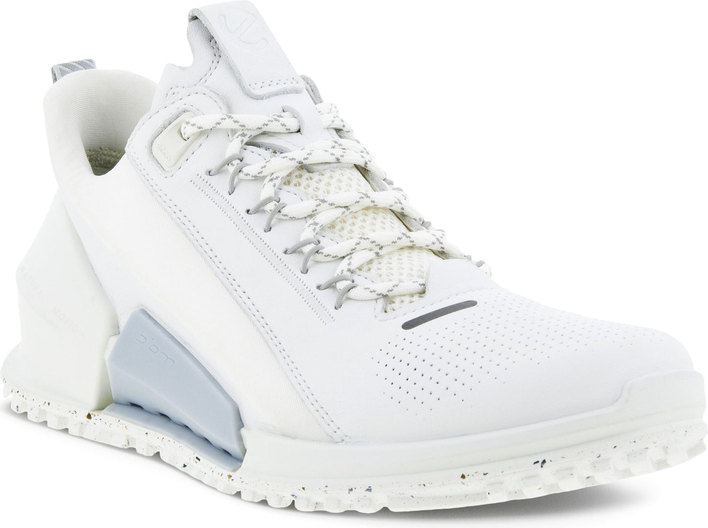 A white sneaker with a textured sole and white laces.