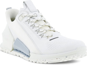 A white sneaker with a textured sole and white laces.