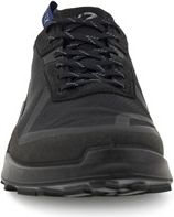 Front view of a black sneaker with a textured sole and patterned laces.