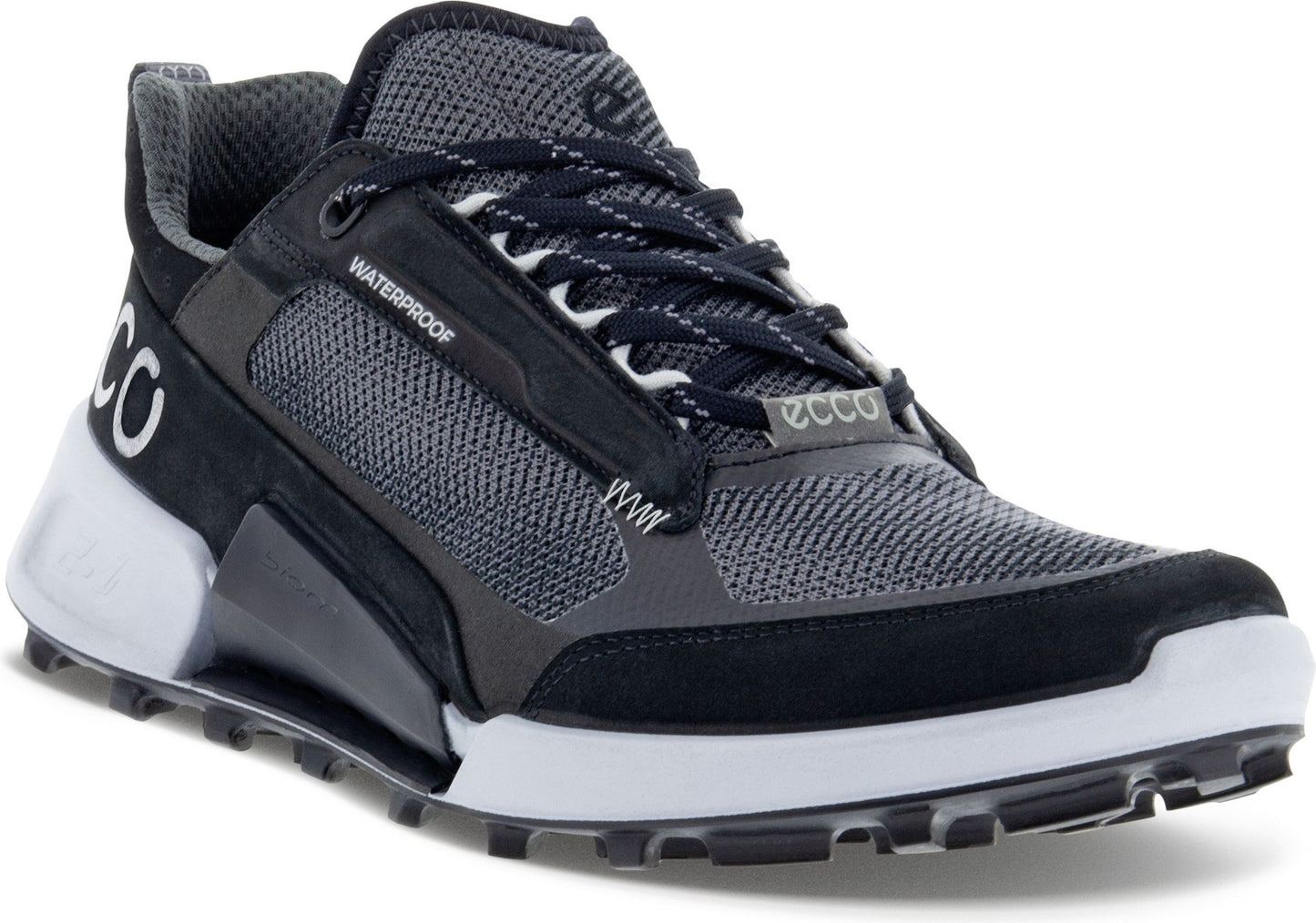 A gray and black waterproof athletic shoe with white accents and rugged tread.