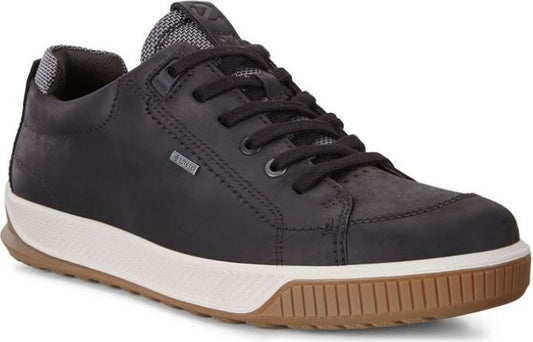 Black leather sneaker with black laces, a white midsole and a brown outsole.
