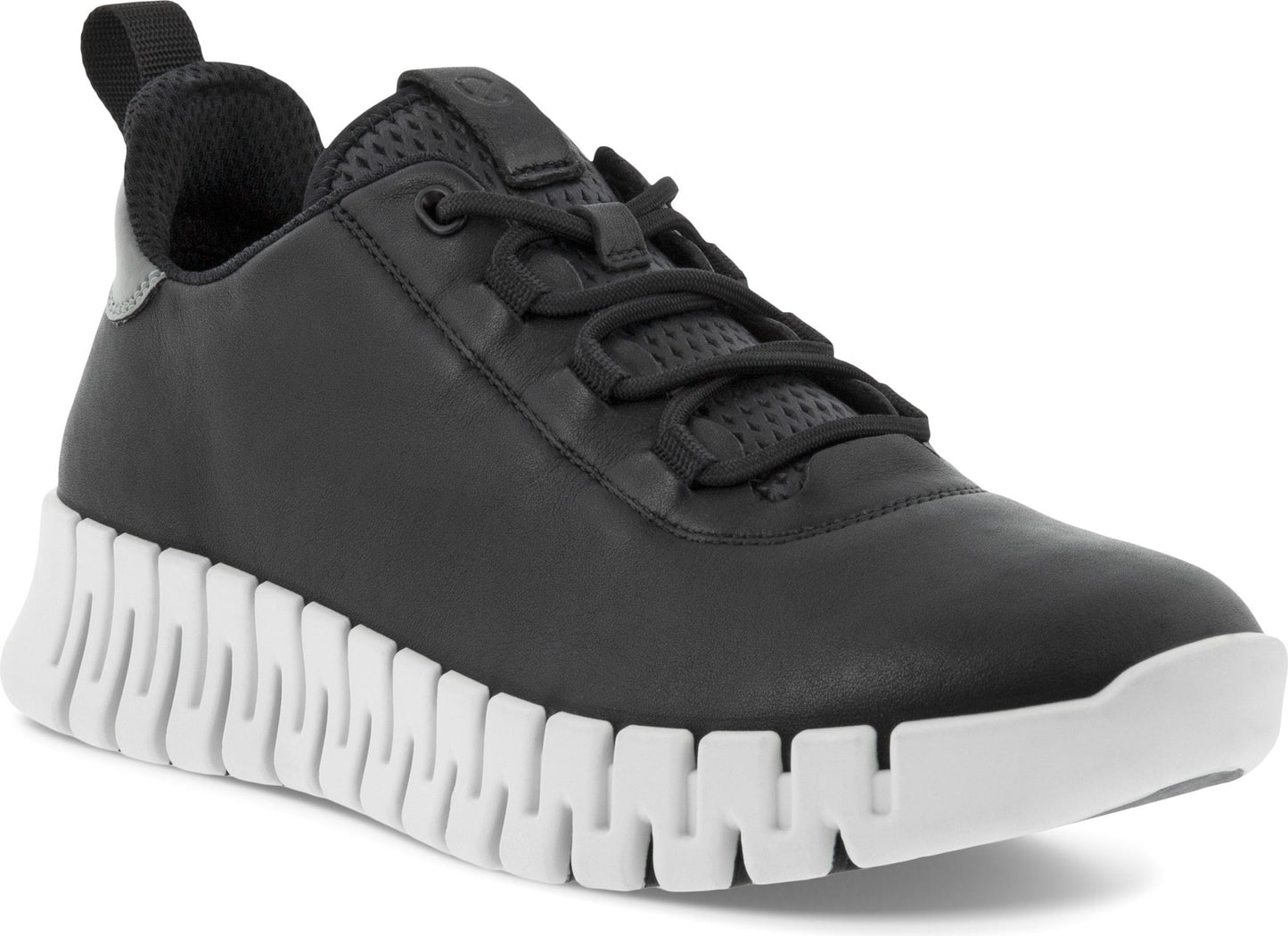 Black sneaker with a unique white, blocky sole, black laces, and a textured upper.
