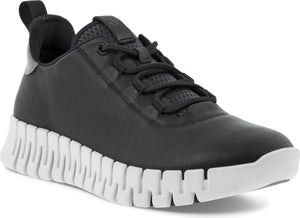 Black sneaker with a unique white, blocky sole, black laces, and a textured upper.
